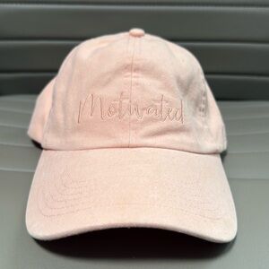 Peach adjustable ball cap by Carrie Underwood.